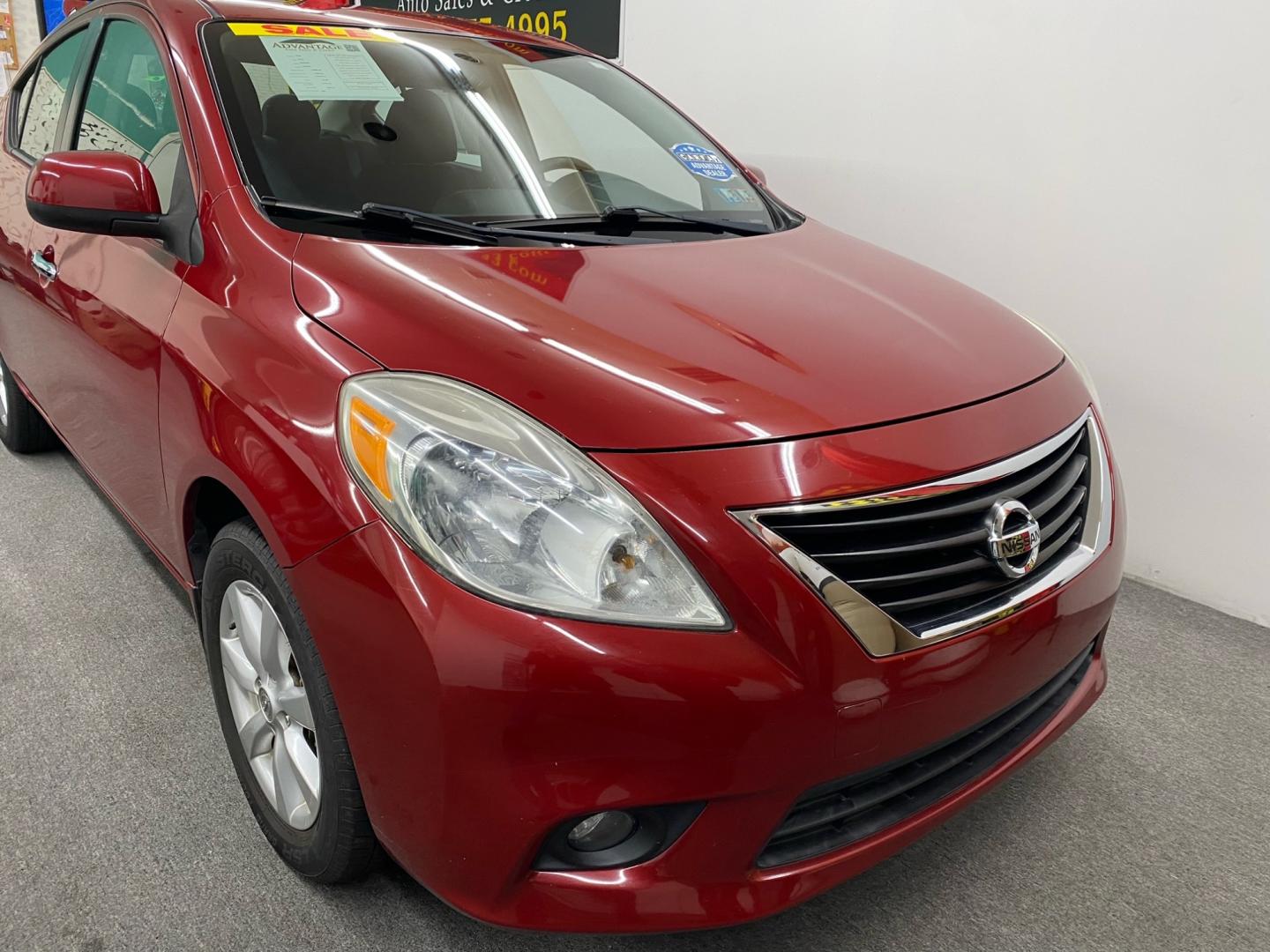 2013 RED /BLACK Nissan Versa (3N1CN7AP5DL) , located at 533 S West End Blvd., Quakertown, PA, 18951, (877) 257-4995, 40.343994, -75.303604 - INCLUDED IN THE SALE PRICE OF EVERY VEHICLE: 48 Hour Money Back Guarantee 6 Month - 6,000 Mile Warranty Brand New PA State Inspection & Emission $10 Oil Changes for the Life of the Loan Complete CARFAX - Photo#1